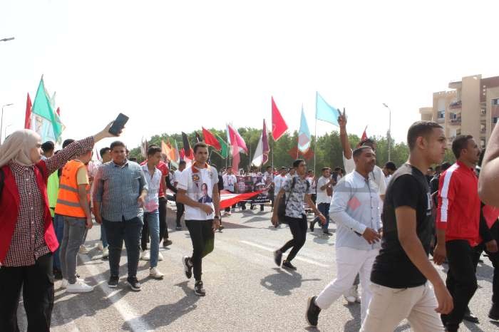 بمشاركة أساتذة وطلاب جامعة سوهاج.. مسيرة احتفالًا بنصر أكتوبر